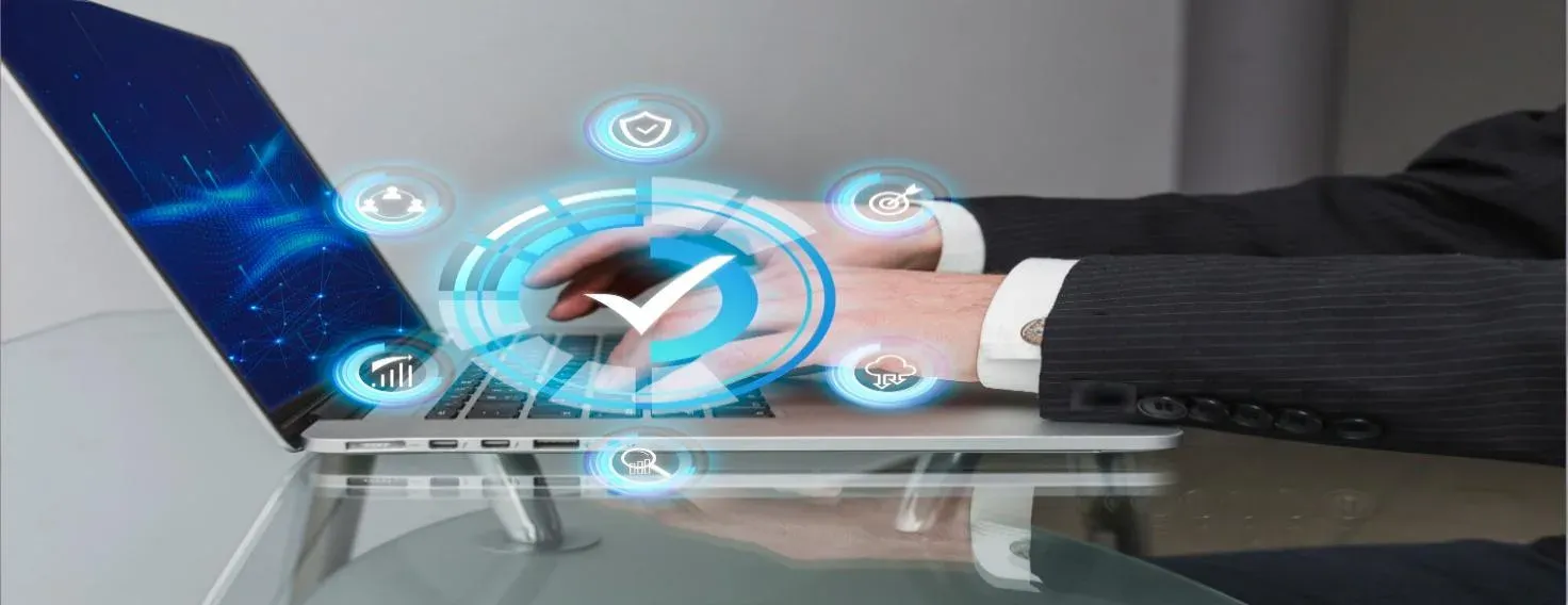 A hand tapping a glowing checkmark interface projected above a laptop screen.